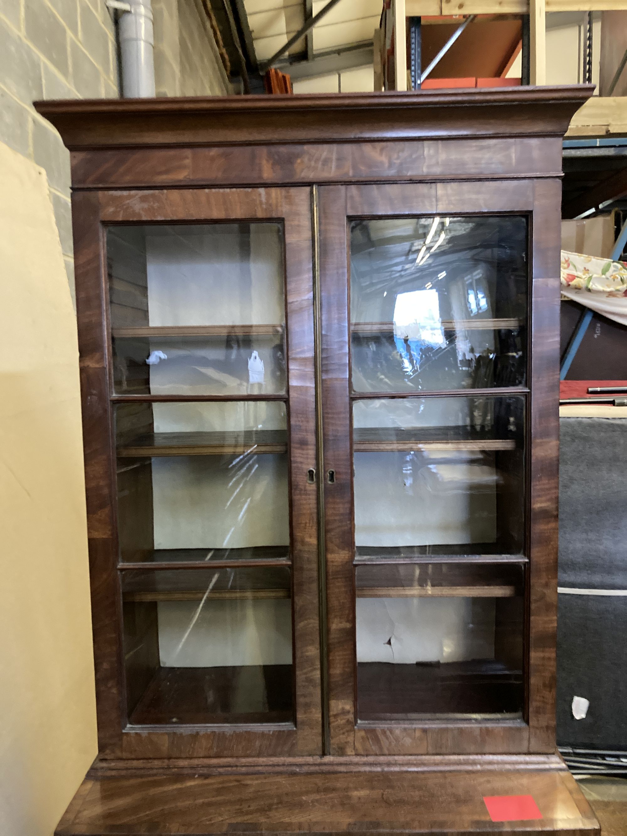 A George III Sheraton style secretaire bookcase, width 79cm, depth 49cm, height 210cm